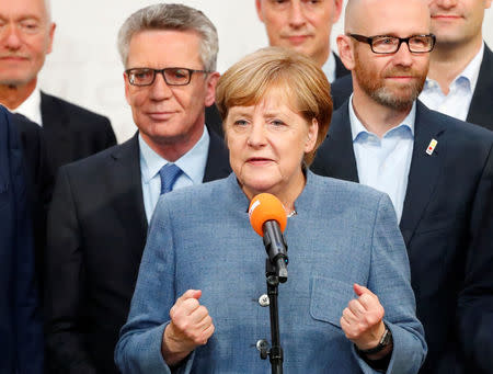 Christian Democratic Union CDU party leader and German Chancellor Angela Merkel reacts after winning the German general election (Bundestagswahl) in Berlin, Germany, September 24, 2017. REUTERS/Fabrizio Bensch