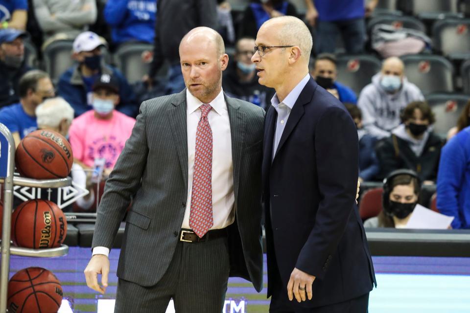 Seton Hall Pirates head coach Kevin Willard and Connecticut Huskies head coach Danny Hurley meet prior to tip off at Prudential Center.