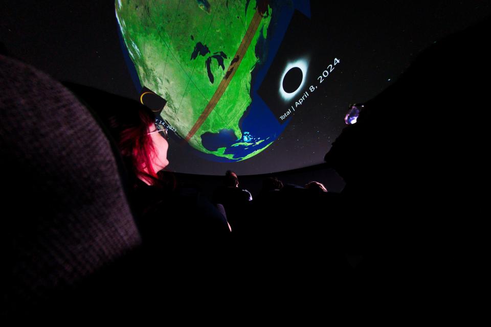 A Ball State University student watching a total solar eclipse program at the Charles W. Brown Planetarium. The facility, Indiana’s largest planetarium, will host a full slate of free activities in the weeks and days leading up to Muncie’s first total solar eclipse in more than 1,000 years on April 8.