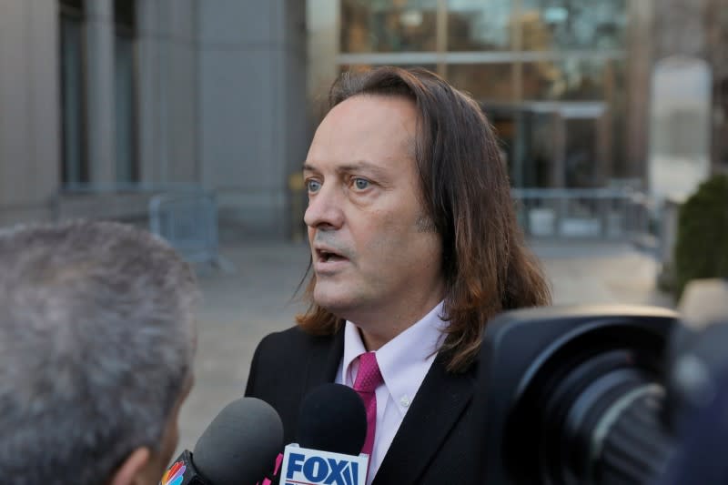T-Mobile US Inc CEO John Legere departs a hearing at Manhattan Federal Court in New York City
