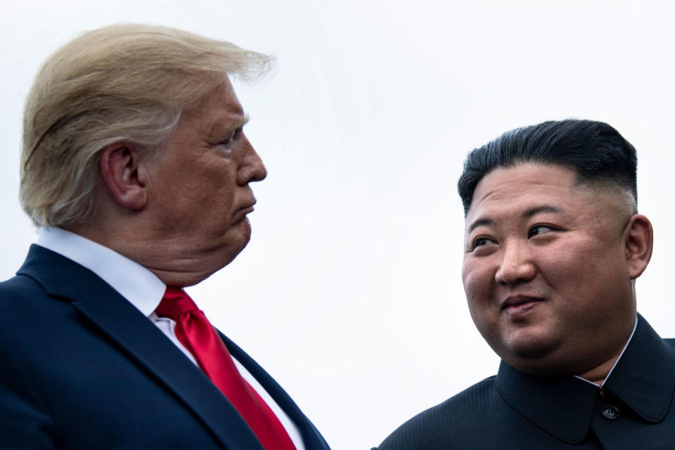 US President Donald Trump and North Korea's leader Kim Jong-un talk during a June meeting in 2019. Source: AP