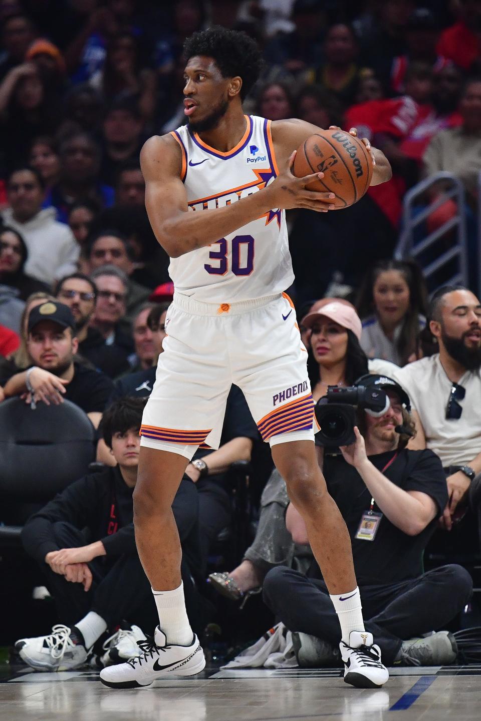 Phoenix Suns forward Thaddeus Young (30) controls the ball against the Los Angeles Clippers during the first half at Crypto.com Arena in Los Angeles on April 10, 2024.