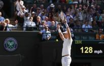 Tennis - Wimbledon - All England Lawn Tennis and Croquet Club, London, Britain - July 11, 2018. South Africa's Kevin Anderson celebrates after winning his quarter final match against Switzerland's Roger Federer. REUTERS/Andrew Boyers