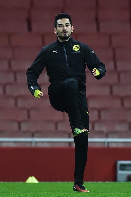 Dortmund's German midfielder Ilkay Gundogan takes part in a training session at the Emirates Stadium in London on November 25, 2014