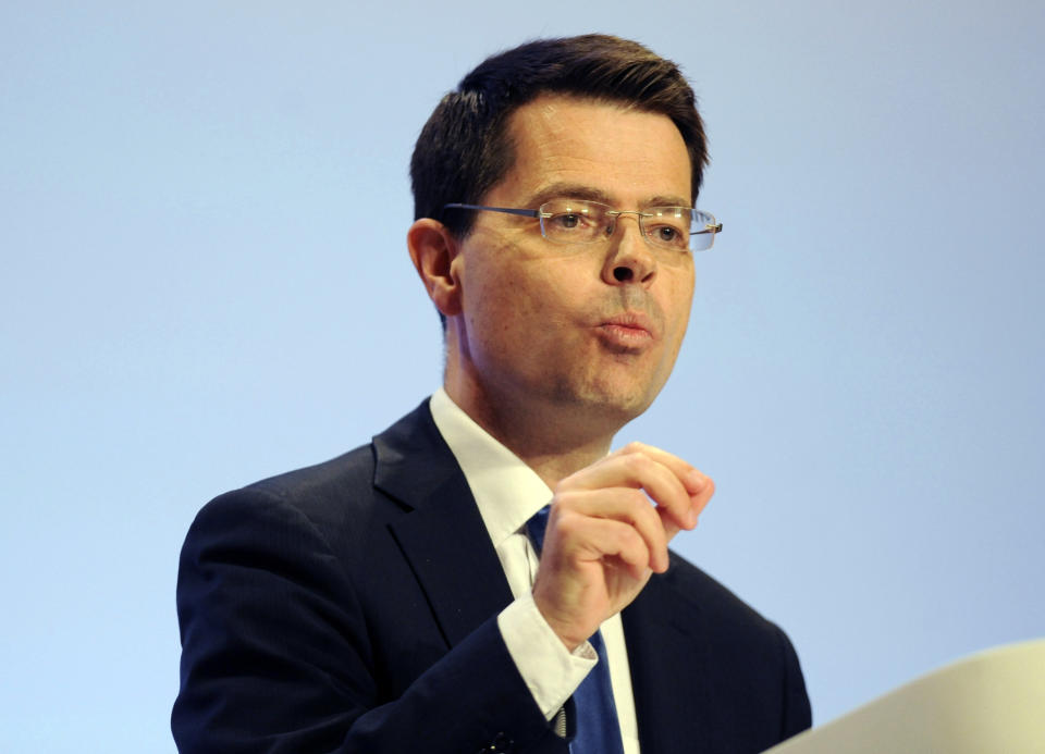 Secretary for Housing, Communities and Local Government James Brokenshire addresses delegates during a speech at the Conservative Party Conference at the ICC, in Birmingham, England, Monday, Oct. 1, 2018. (AP Photo/Rui Vieira)