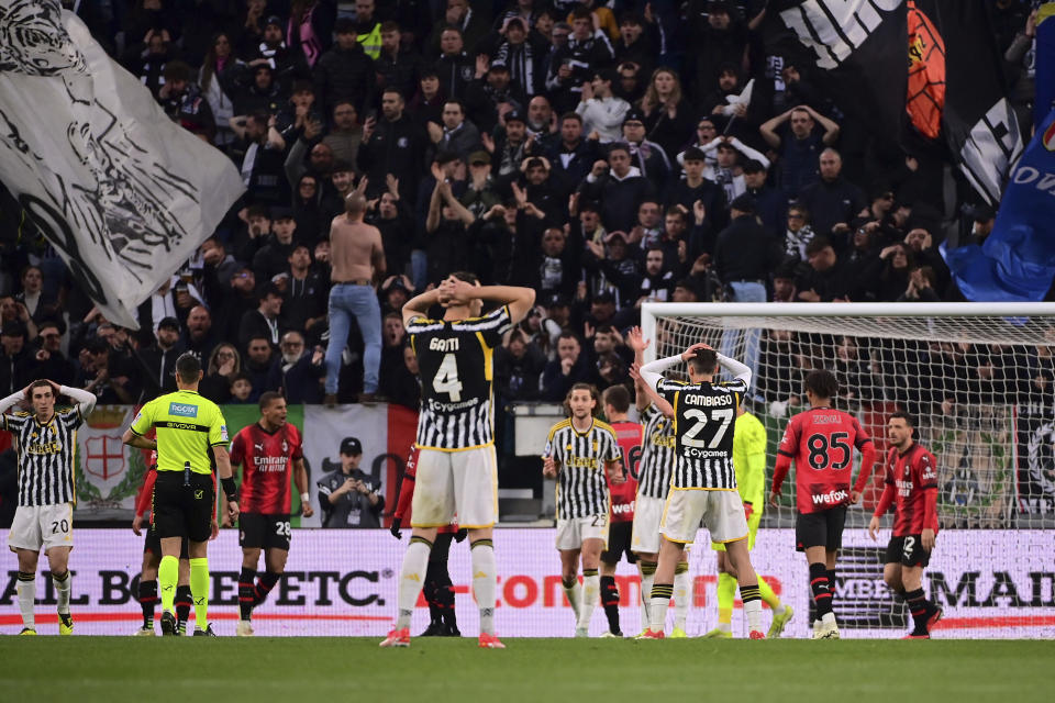 Juventus' players are dejected at the end of a Serie A soccer match between Juventus and Milan at the Allianz Stadium in Turin, Italy, Saturday, April 27, 2024. The match ended 0-0. (Marco Alpozzi/LaPresse via AP)