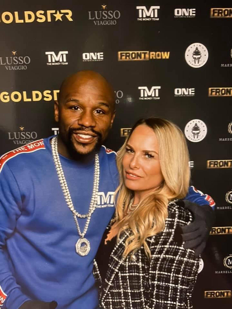 As part of her job as an agency boss, Wilson gets to attend red carpet events, pictured with Floyd Mayweather. (Collect/ PA Real Life)