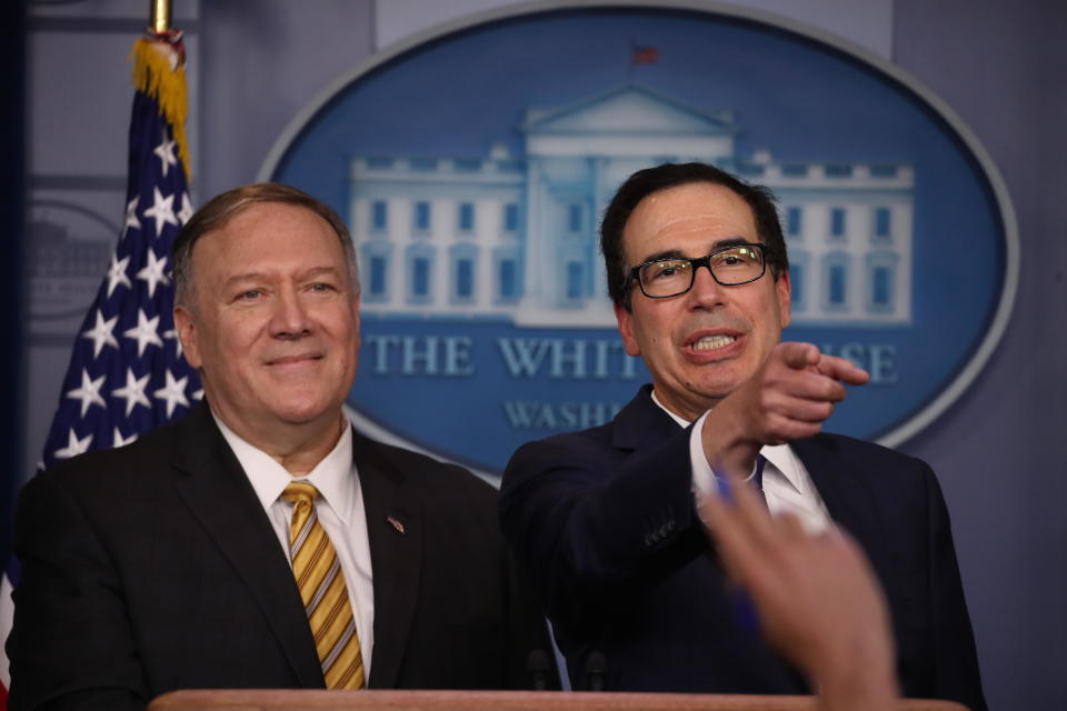 In this photo from Sept. 10, 2019, Secretary of State Mike Pompeo, left, and Treasury Secretary Steven Mnuchin brief reporters at the White House. / Credit: Mark Wilson / Getty Images