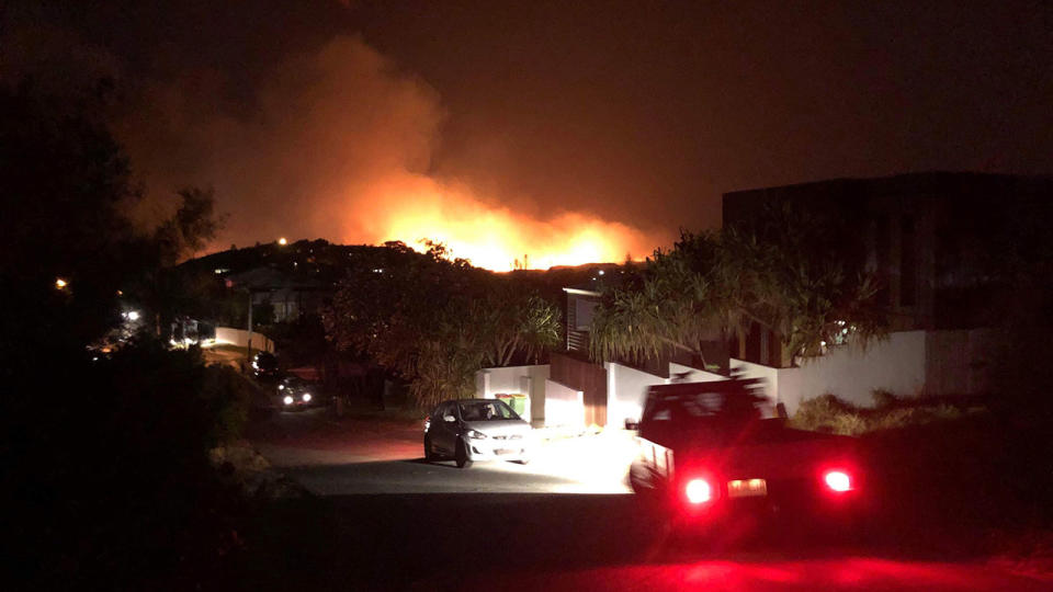 Hundreds of residents have evacuated from Peregian Springs, Queensland as bushfires rage in the area. Source: AAP