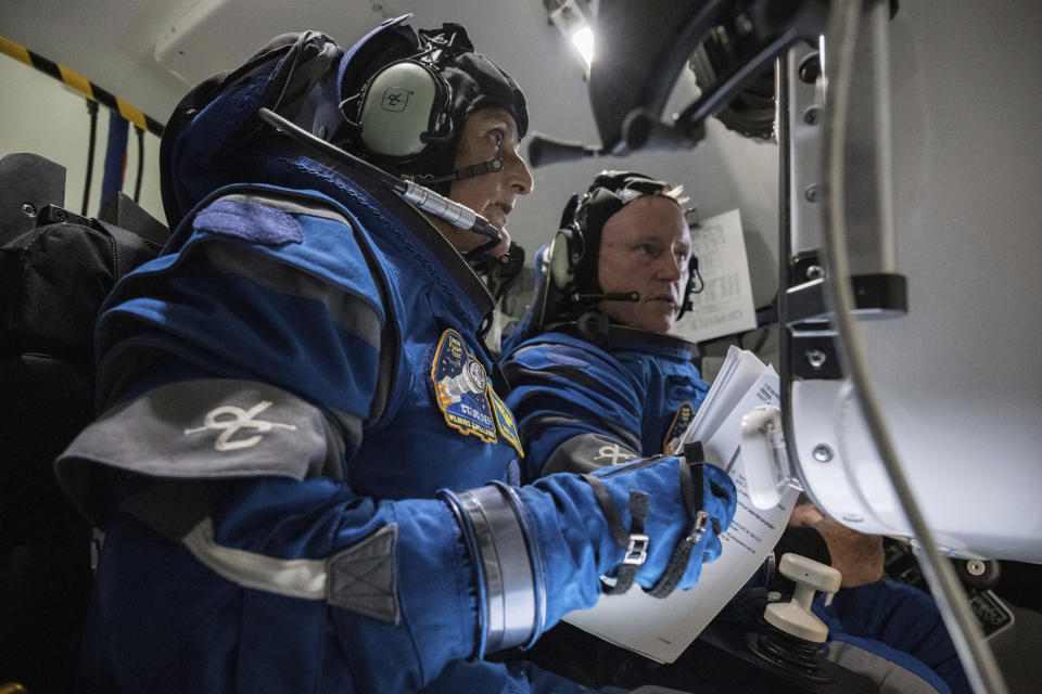 Boeing Crew Flight Test crew members Suni Williams and Butch Wilmore work in the Boeing Starliner simulator at the Johnson Space Center in Houston on Nov. 3, 2022. The first flight of Boeing’s Starliner capsule with a crew on board is scheduled for Monday, May 6, 2024. (NASA/Robert Markowitz)