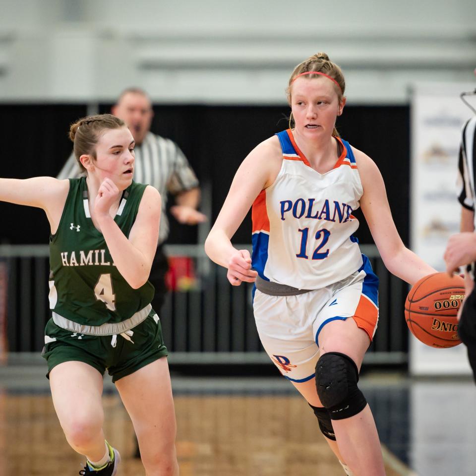 Poland's Logan Cookinham dribbles the ball against Hamilton during Section III's Class D championship game Saturday at SRC Arena on the Onondaga Community College campus.