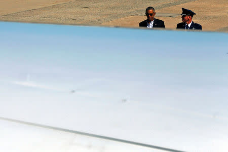 U.S. President Barack Obama walks to board Air Force One for travel to view flood damaged area in Louisiana from Joint Base Andrews, Maryland, U.S., August 23, 2016. REUTERS/Jonathan Ernst