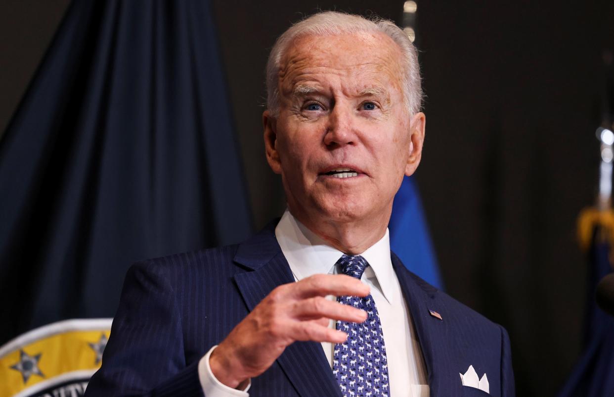 File: Joe Biden delivers remarks as he visits the Office of the Director of National Intelligence in McLean, Virginia on 27 July 2021 (REUTERS)