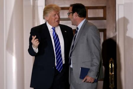 U.S. President-elect Donald Trump stands with Todd Ricketts, co-owner of the MLB baseball team the Chicago Cubs following their meeting at the main clubhouse at Trump National Golf Club in Bedminster, New Jersey, U.S., November 19, 2016. REUTERS/Mike Segar