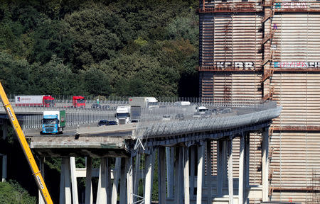 FILE PHOTO: The collapsed Morandi Bridge is seen in the Italian port city of Genoa, Italy. REUTERS/Stefano Rellandini