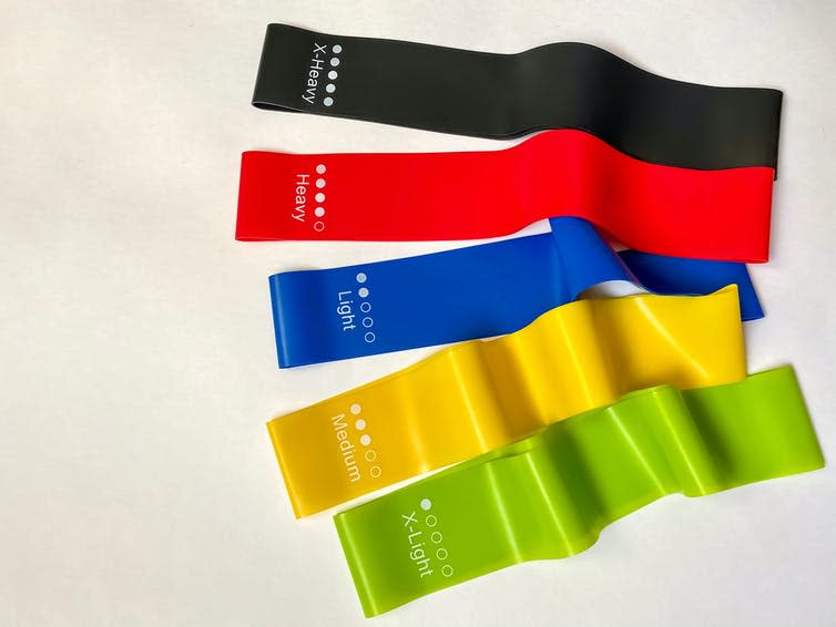 Five resistance bands with varying degrees of tension, from extra light to extra heavy.