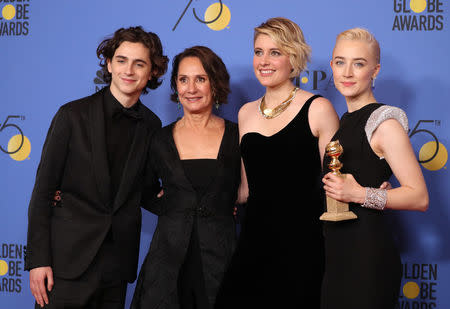 75th Golden Globe Awards – Photo Room – Beverly Hills, California, U.S., 07/01/2018 – (L-R) Timothee Chalamet, Laurie Metcalf, Greta Gerwig and Saoirse Ronan pose backstage with their Best Motion Picture -Musical or Comedy award for 'Lady Bird." REUTERS/Lucy Nicholson