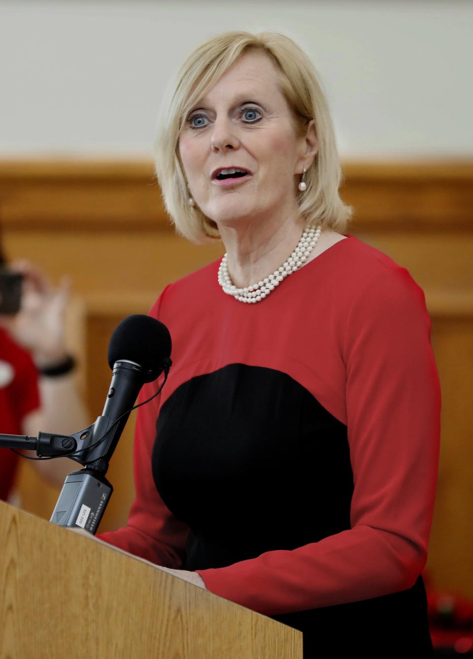 Stacy Butterfield, Polk County clerk of the circuit court and comptroller, gives the wedding vows during the Seventh annual Valentine's Day group wedding at the Polk County History Center in Bartow, Florida February 14, 2020. [PIERRE DUCHARME/THE LEDGER]