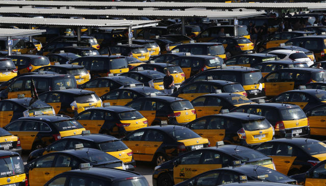 Barcelona taxis strike to protest ride-hailing apps