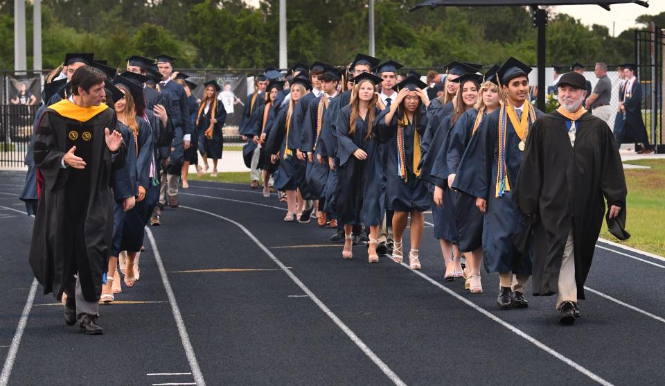 After an hour delay from rain and lighting, the Holy Trinity Episcopal Academy graduation ceremony took place under clear skies in the Kelly Stadium at the school Saturday night, May 18th.