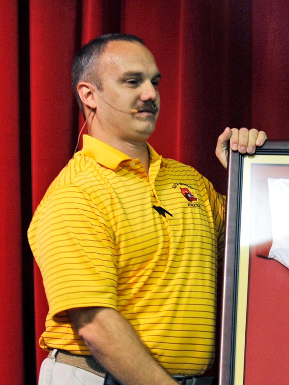 Chris Hixon was the athletic director at Marjory Stoneman Douglas High School (AP)