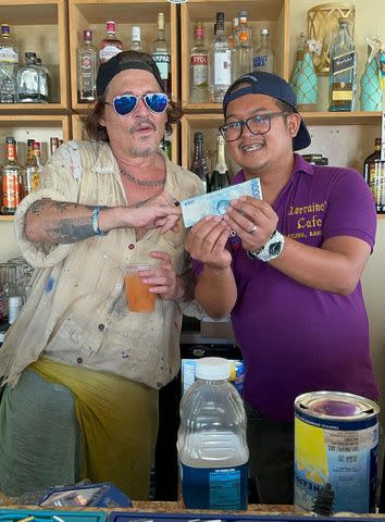 <p>Ralf Zoilo/Killer Bartender/Mega</p> Johnny Depp in the Bahamas on Aug. 28, 2024