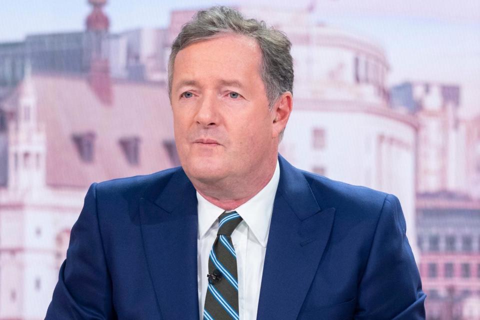 Piers Morgan slams 'grotesquely offensive' Madonna for wearing a burka to walk through JFK airport