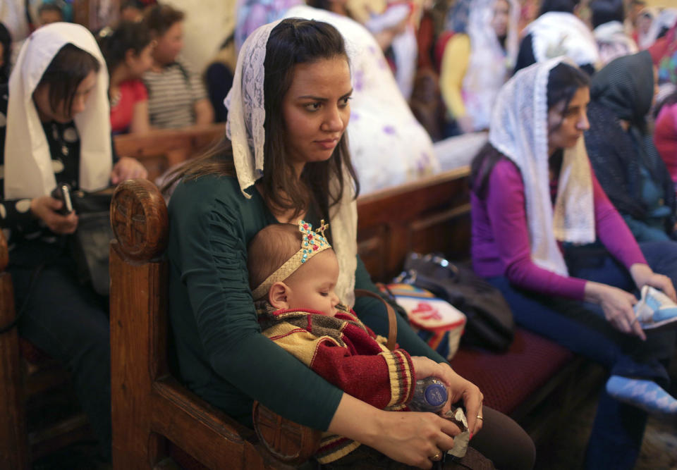 Egyptian Copts attend a mass on Palm Sunday in old Cairo