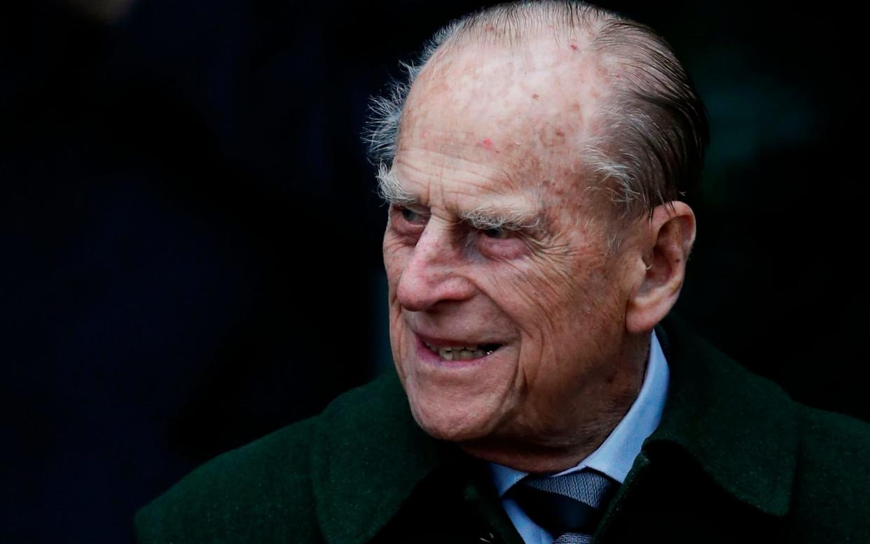 The Duke of Edinburgh was making churchgoers chuckle - AFP