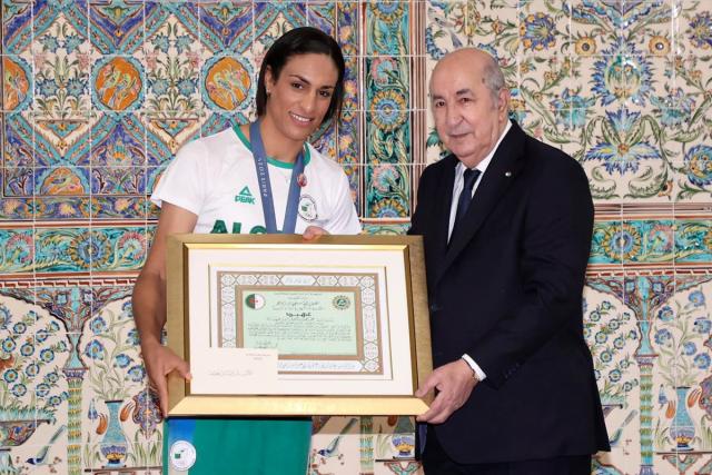 Gender row boxer Imane Khelif given hero's welcome by Algerian president  after gold medal win