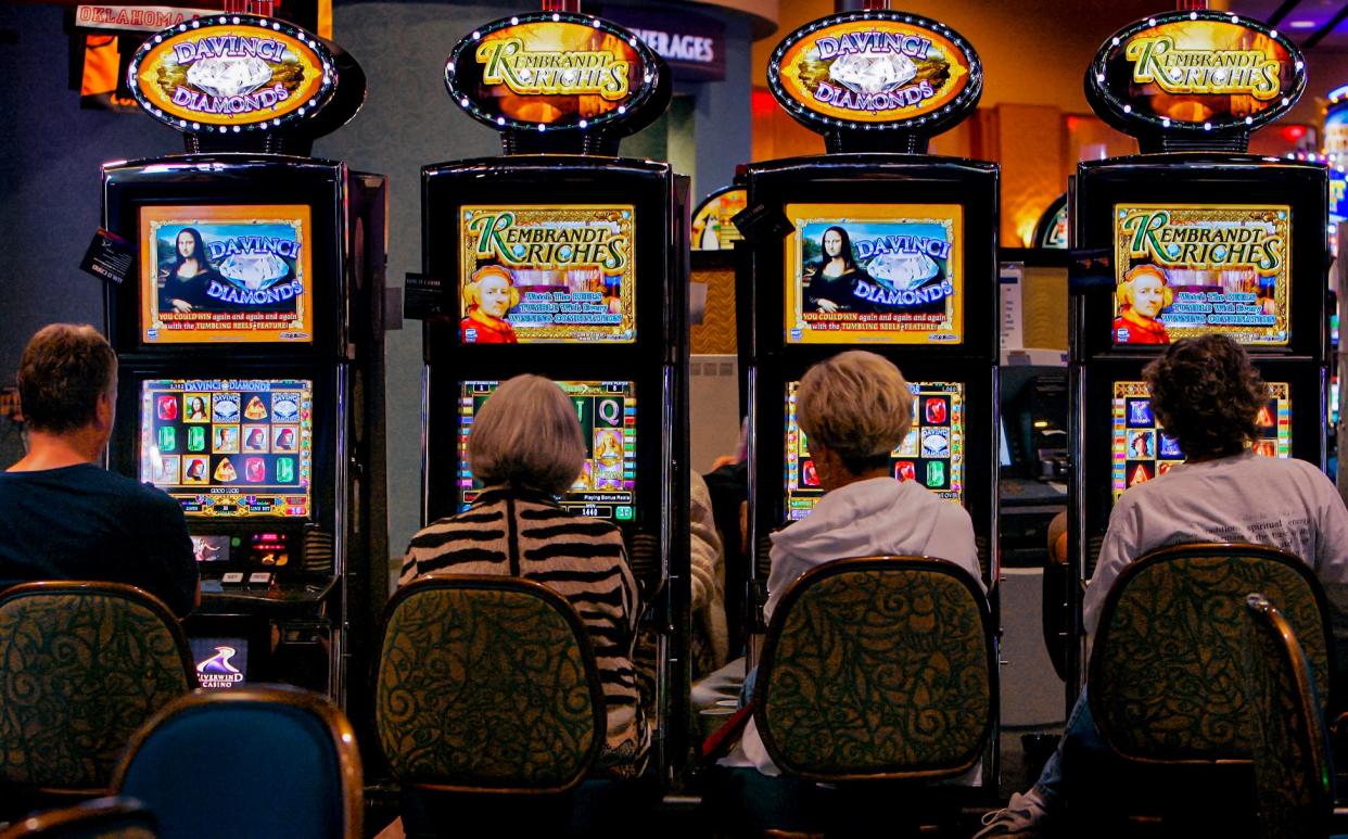 Patrons play gaming machines at Riverwind Casino in Norman,OK. Wed. June, 3, 2009. Photo by Jaconna Aguirre, The Oklahoman. ORG XMIT: KOD