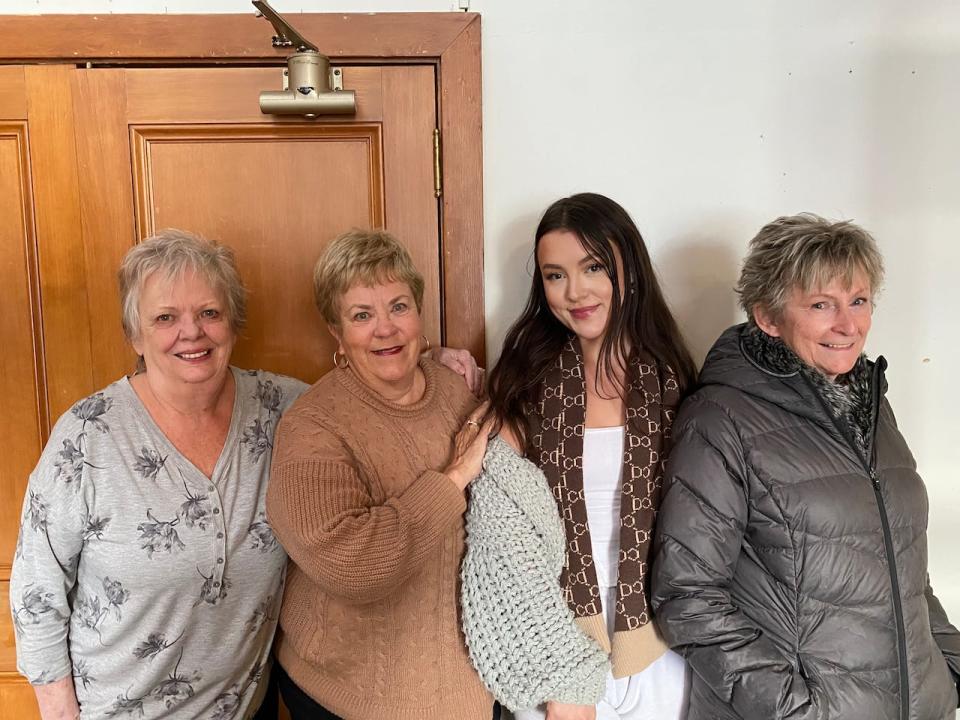 Kevin Edward McGowan's family at Dawson City's courthouse. From left to Right, Wendy Henschell,Dianna McGowan, Brogan Tansowny, Pat Socher.