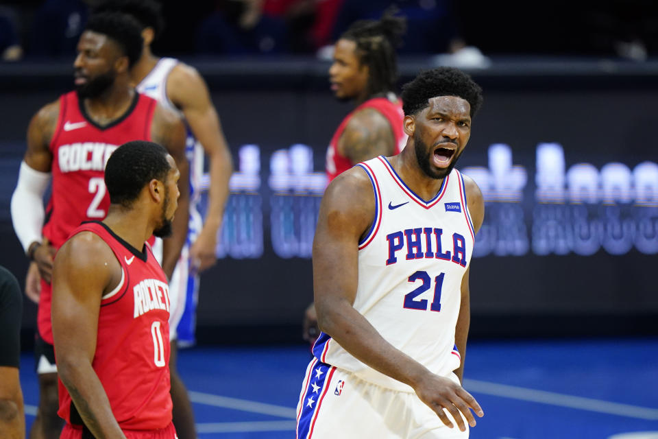 Philadelphia 76ers' Joel Embiid reacts after being called for a foul during the second half of an NBA basketball game against the Houston Rockets, Wednesday, Feb. 17, 2021, in Philadelphia. (AP Photo/Matt Slocum)
