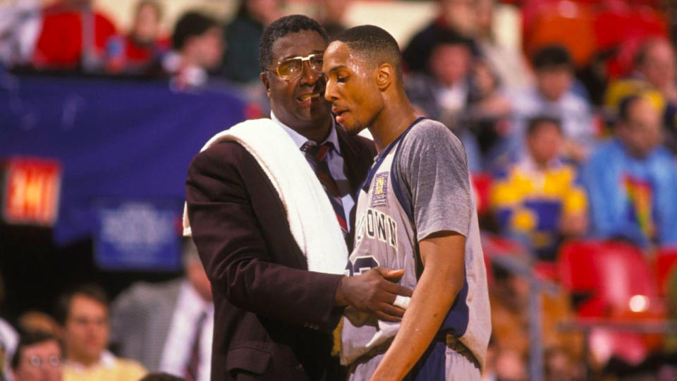 Thompson is pictured here with former Georgetown college star Alonzo Mourning.