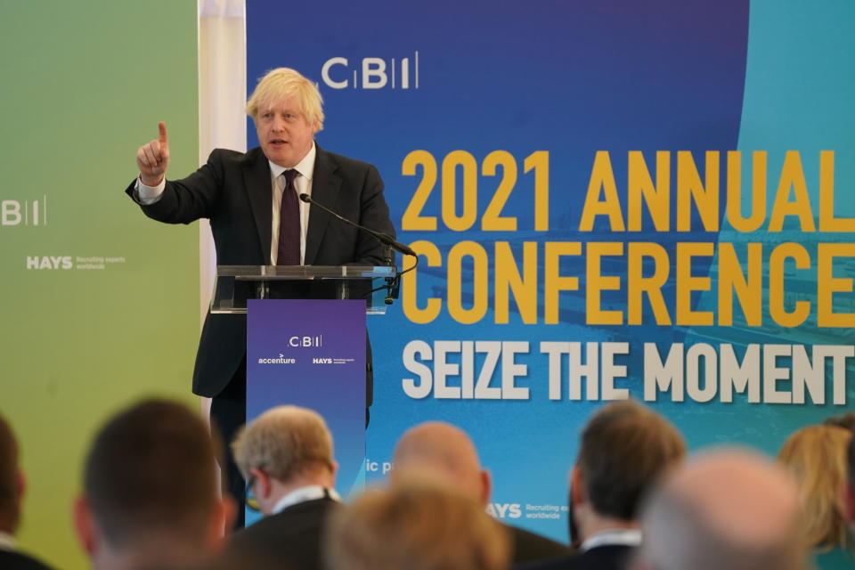 Prime Minister Boris Johnson speaks during the CBI (Confederation of British Industry) annual conference, at the Port of Tyne, in South Shields, England, Monday Nov. 22, 2021. (Owen Humphreys/Pool Photo via AP)