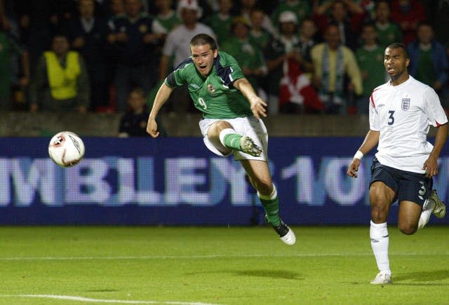 Northern Ireland striker David Healy scores the only goal in the World Cup qualifier against England