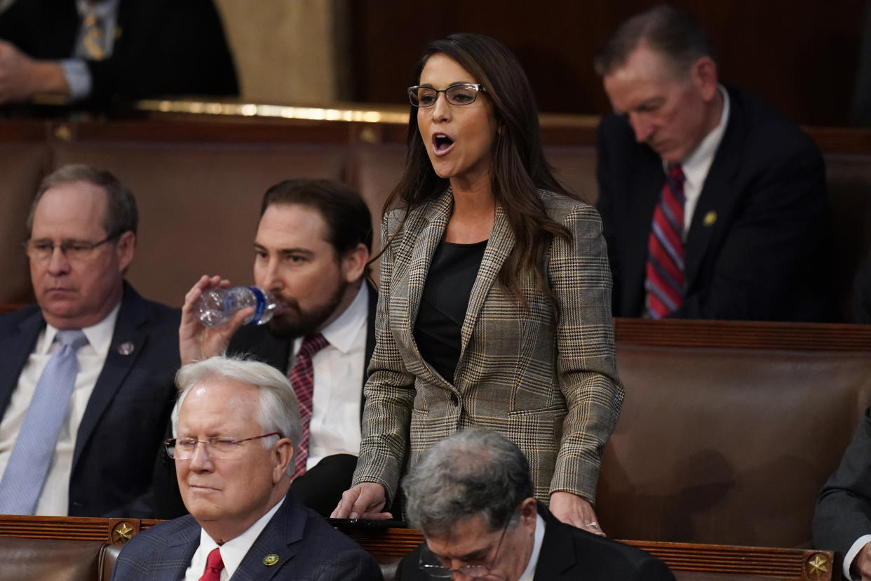 Rep. Lauren Boebert, R-Colo., casts a vote for Rep. Kevin Hern, R-Okla., during the eight round of voting in the House chamber as the House meets for the third day to elect a speaker and convene the 118th Congress in Washington, Thursday, Jan. 5, 2023. (AP Photo/Alex Brandon)