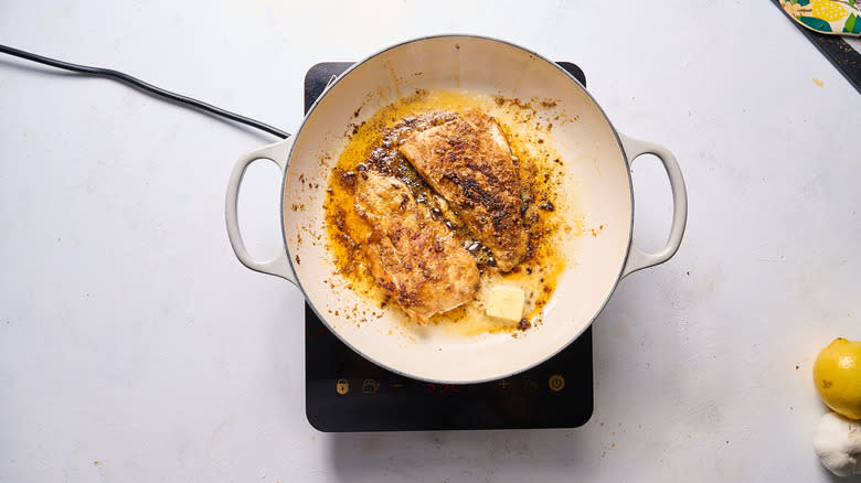 searing fish in skillet