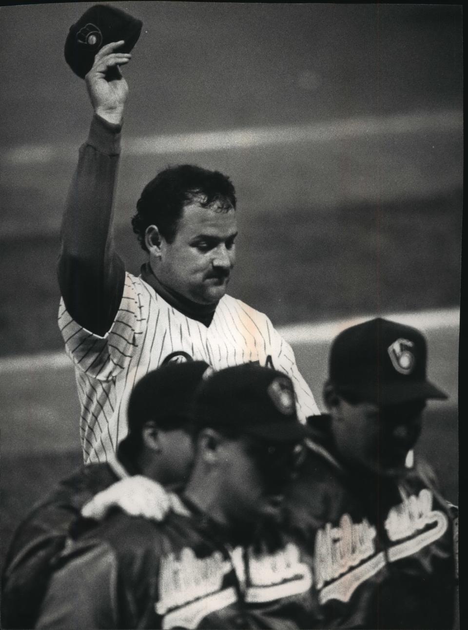 Pitcher Chris Bosio tips his cap after throwing a shutout in 1992.