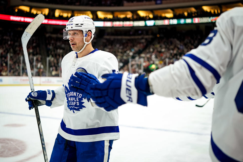 Dec 4, 2021; Saint Paul, Minnesota, USA; Toronto Maple Leafs forward Jason Spezza (19) celebrates his goal with teammates during the second period against the Minnesota Wild at Xcel Energy Center. Mandatory Credit: Brace Hemmelgarn-USA TODAY Sports