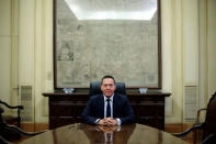 Governor of the Central Bank of Greece Yannis Stournaras poses for a picture during an interview with Reuters at the bank's headquarters in Athens, Greece, November 8, 2016. Picture taken November 8, 2016. REUTERS/Alkis Konstantinidis