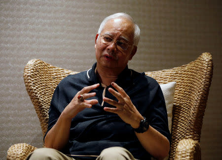 FILE PHOTO: Malaysia's former prime minister Najib Razak speaks to Reuters during an interview in Langkawi, Malaysia June 19, 2018. REUTERS/Edgar Su/File Photo