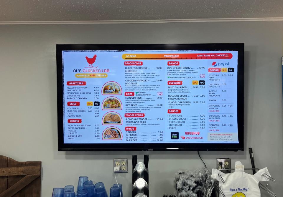The menu at Al's Chicken Lab, which recently opened in the former Pizza Hut building on North 21st Street in north Newark.