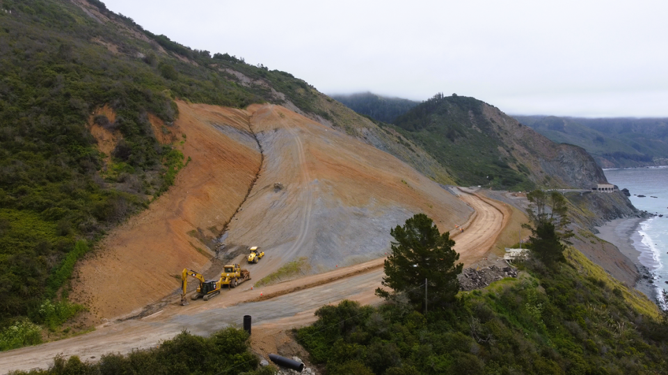 The new road at Paul’s Slide on Highway 1 will be higher than the original road, which allows construction crews to install better drainage systems under that half-mile section of the road.