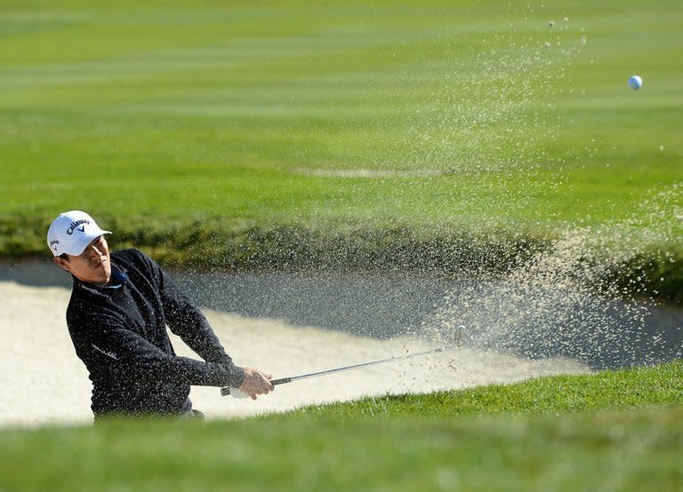 James Hahn hits out of the bunker on the first hole during the third round of the AT&T Pebble Beach National Pro-Am on February 9, 2013 in Pebble Beach, California. Hahn shares the lead at on 12-under 202 with Brandt Snedeker