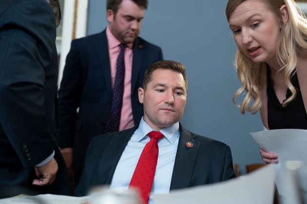 Rep. Guy Reschenthaler (R-Pa.) confers with an aide as the House Rules Committee meets to prepare Speaker Kevin McCarthy's debt ceiling package for the floor, on Capitol Hill in Washington, on April 25. Reschenthaler serves as Speaker McCarthy's chief deputy whip in the Republican Conference. 