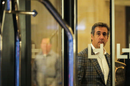 U.S. President Donald Trump's personal lawyer Michael Cohen leaves a hotel in New York City, U.S., April 13, 2018. REUTERS/Jeenah Moon