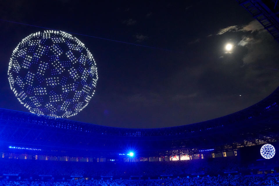 TOKYO, JAPAN - JULY 23: A drone display is seen over the top of the stadium during the Opening Ceremony of the Tokyo 2020 Olympic Games at Olympic Stadium on July 23, 2021 in Tokyo, Japan. (Photo by Wei Zheng/CHINASPORTS/VCG via Getty Images)