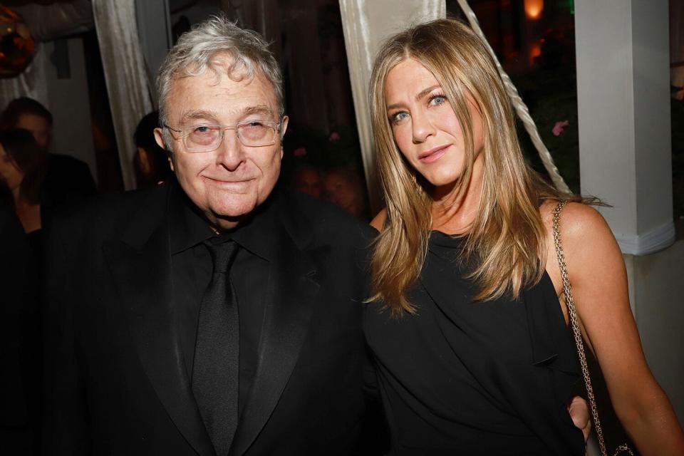 Jennifer Aniston poses with Best Original Song nominee Randy Newman at the 2020 Netflix Oscar Afterparty. 