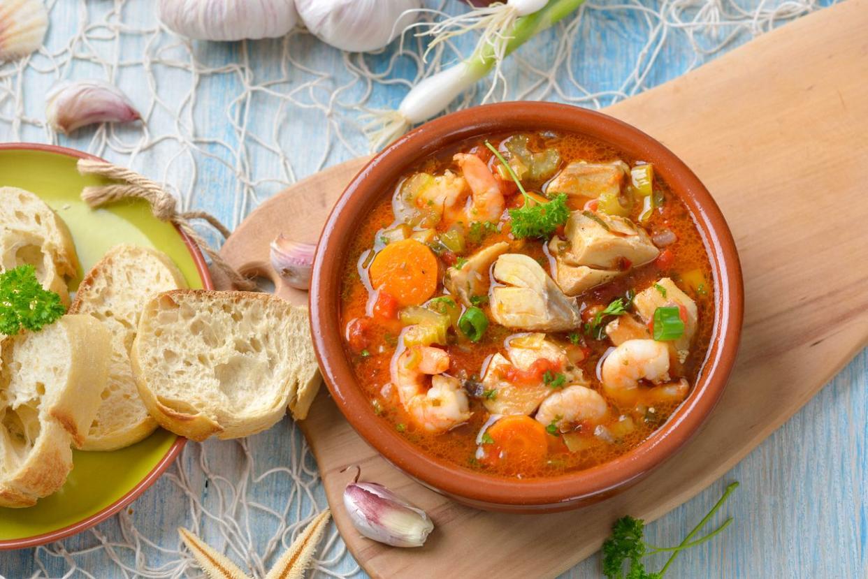 Mediterranean bouillabaisse served with fresh white bread